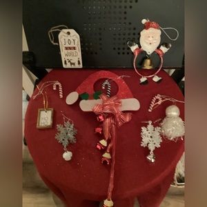 Christmas ornaments and a door bell Santa hat with multiple bells